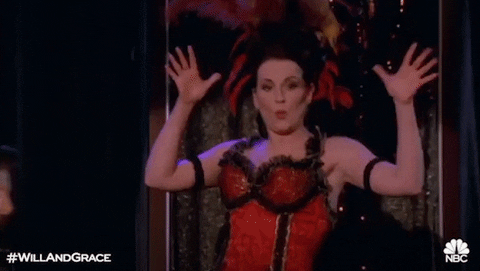 Animated image of Megan Mullally as Karen from Will & Grace demonstrating Jazz Hands